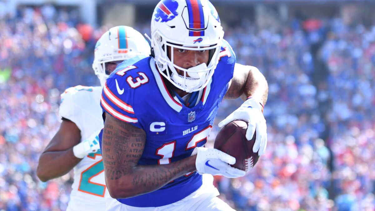 Buffalo Bills wide receiver Gabe Davis running with a football.