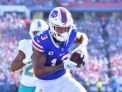 Buffalo Bills wide receiver Gabe Davis running with a football.